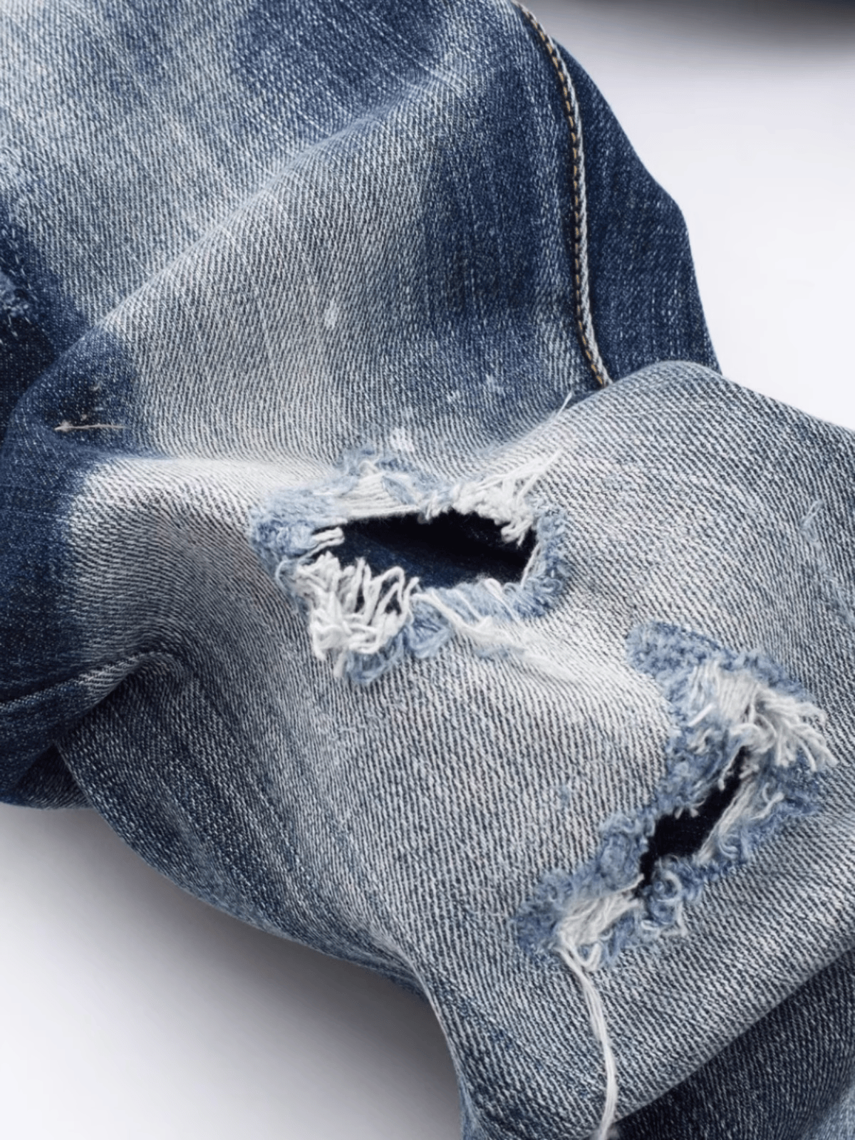 Unique Washed Ripped Jeans