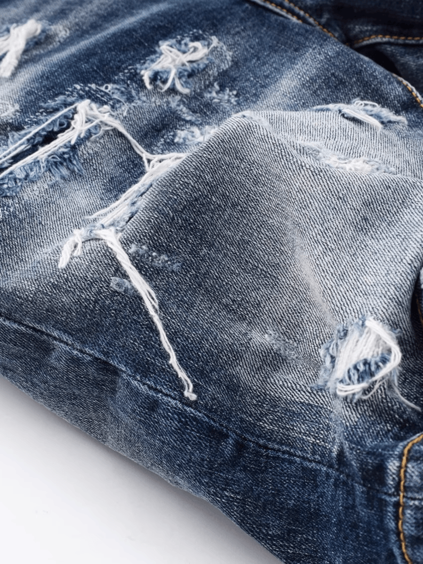 Washed Blue Ripped Jeans